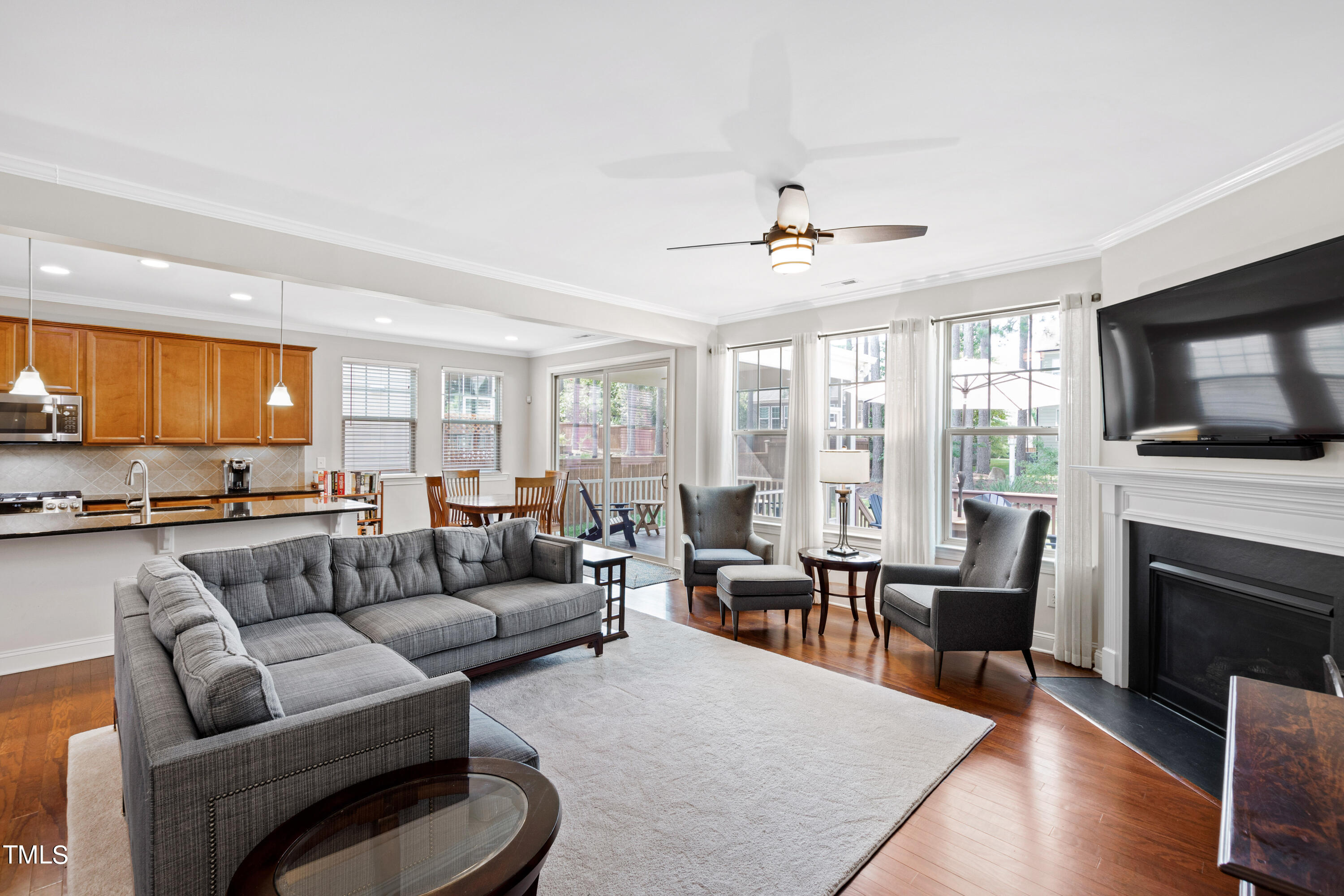 6004 Clapton Drive Wake Forest, NC 27587 - Photo 21 of 52 a living room with furniture fireplace and flat screen tv
