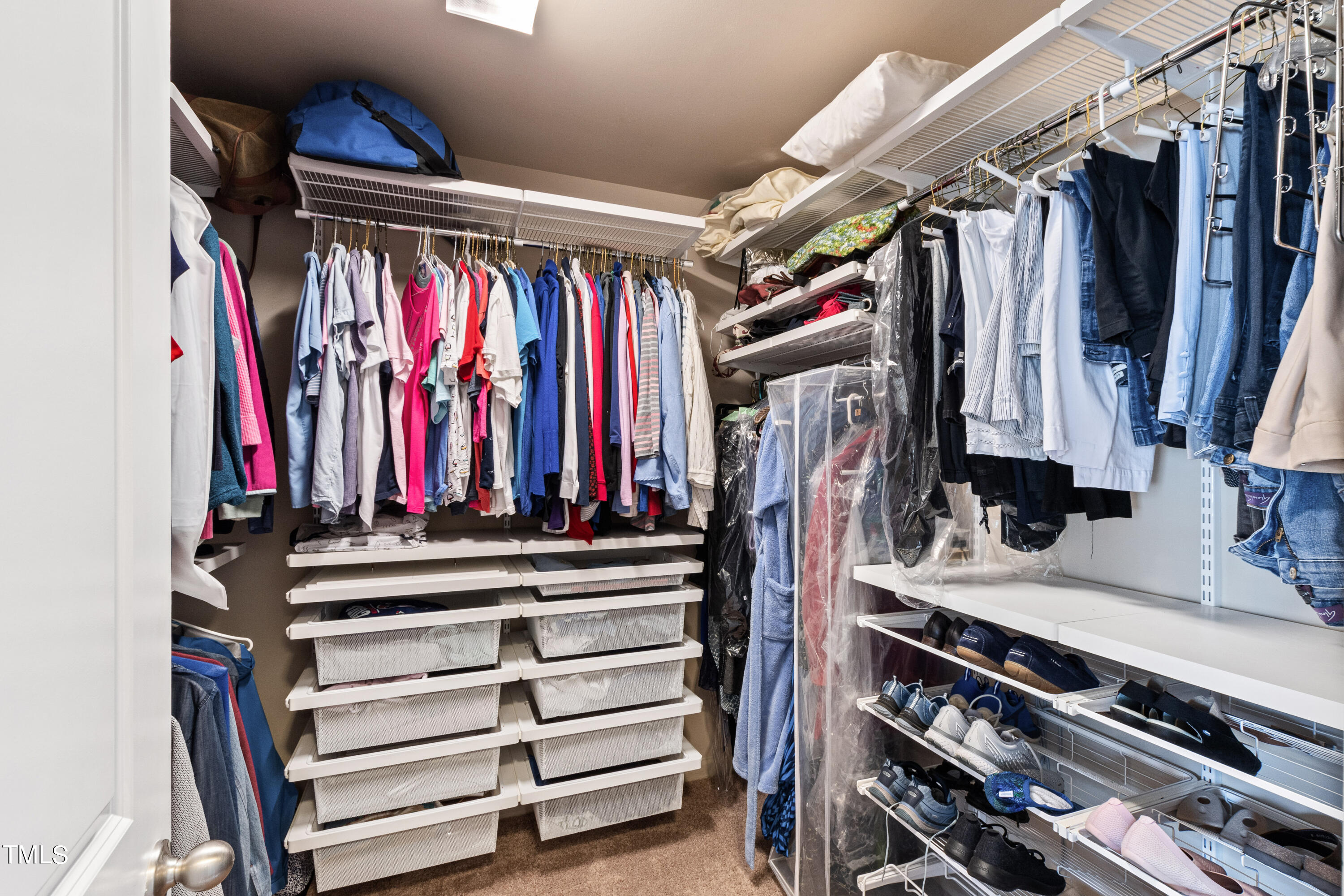 6004 Clapton Drive Wake Forest, NC 27587 - Photo 36 of 52 a view of walk in closet with clothes