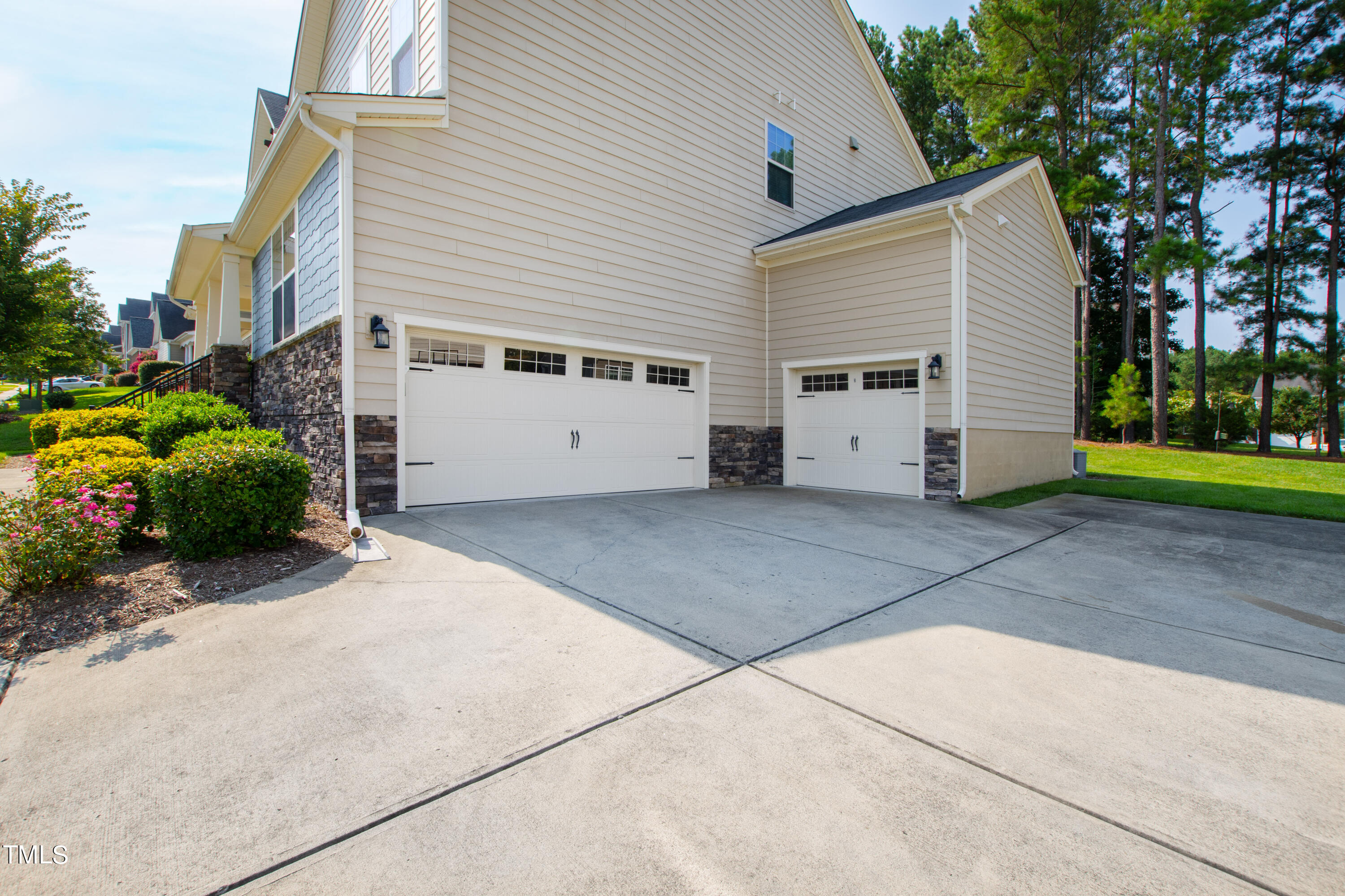 6004 Clapton Drive Wake Forest, NC 27587 - Photo 4 of 52 a view of a house with a backyard and garden