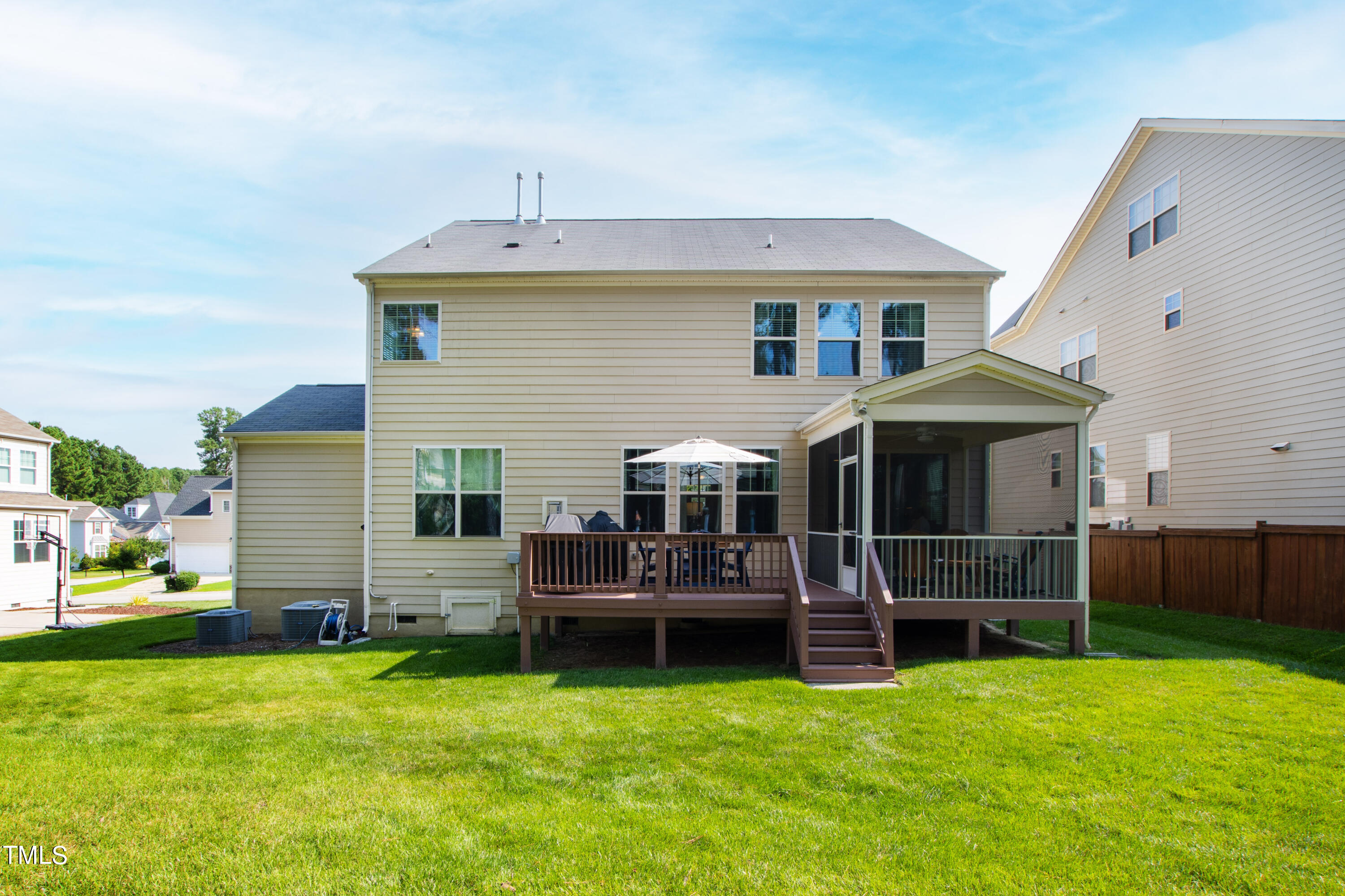 6004 Clapton Drive Wake Forest, NC 27587 - Photo 50 of 52 a view of a house with a yard and sitting area