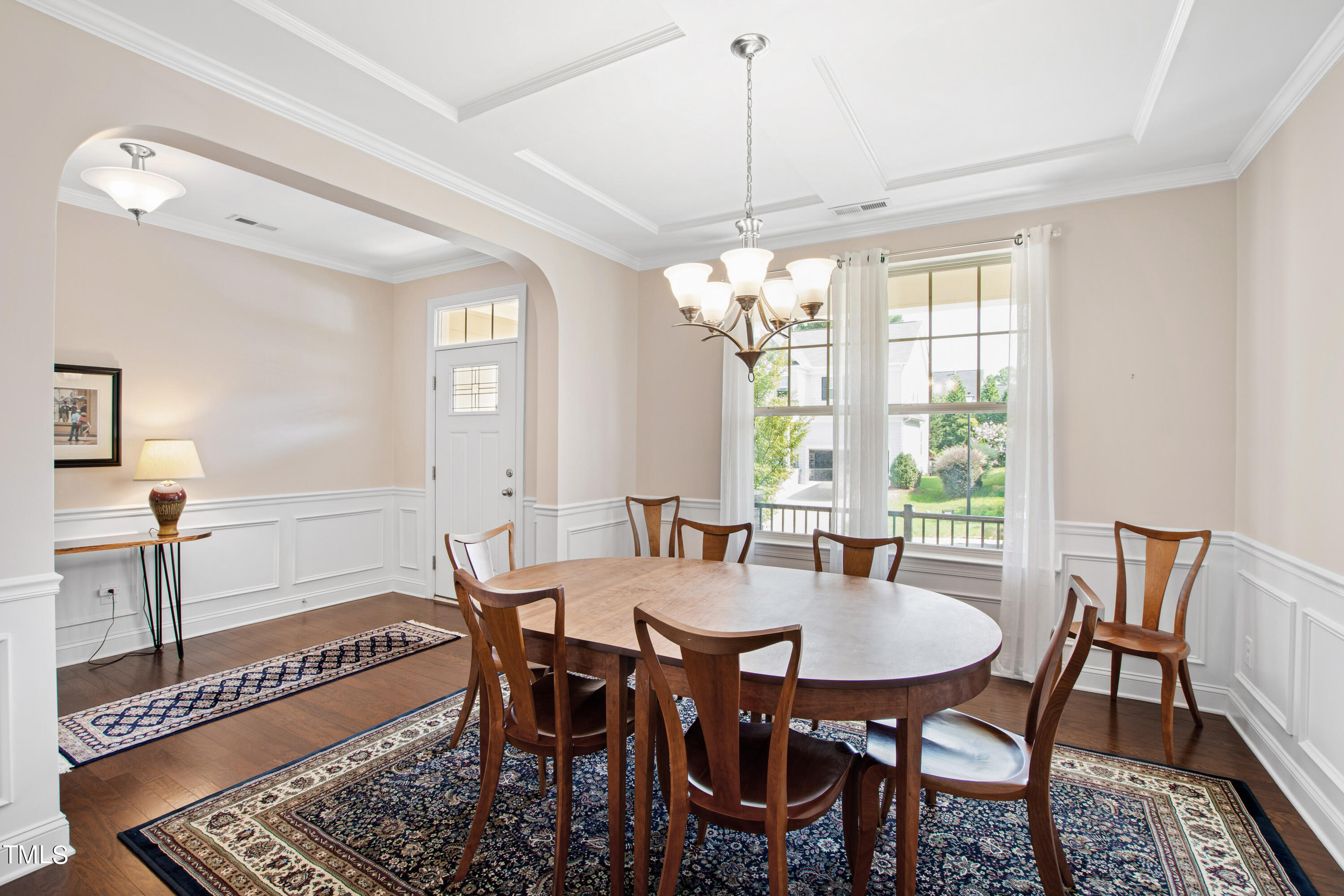 6004 Clapton Drive Wake Forest, NC 27587 - Photo 8 of 52 a view of a dining room with furniture window and wooden floor