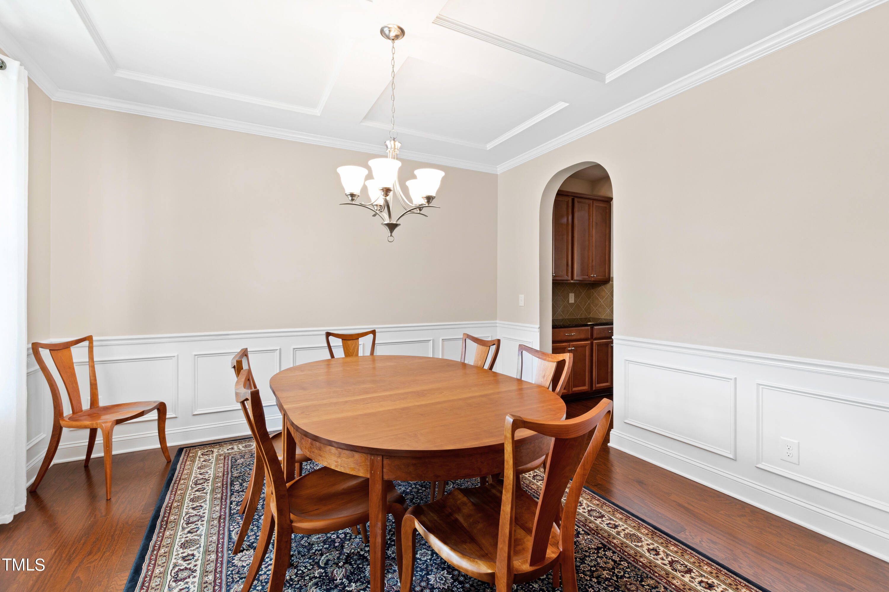 6004 Clapton Drive Wake Forest, NC 27587 - Photo 9 of 52 a view of a dining room with furniture and wooden floor