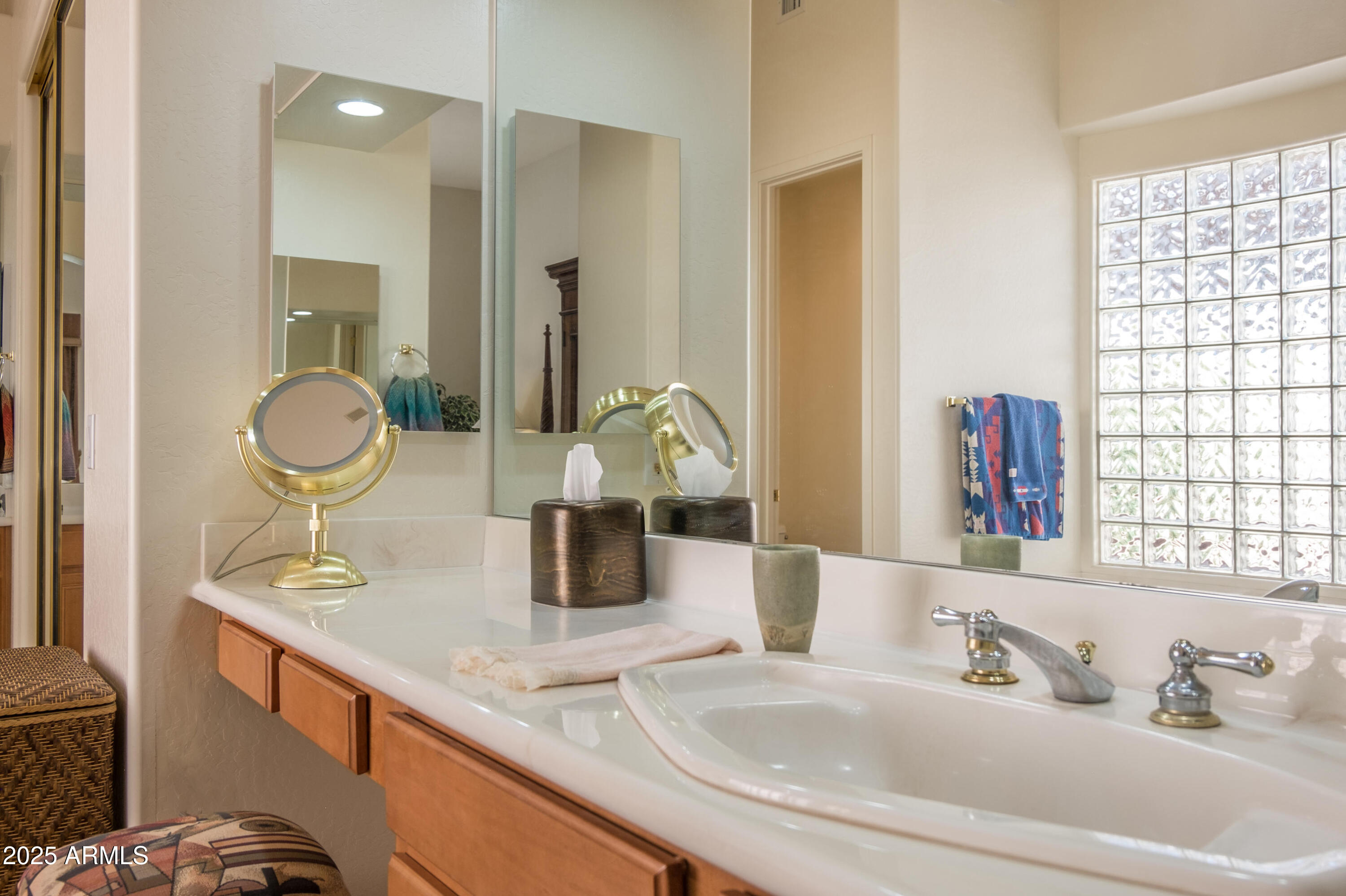 722 Crown Ridge Road Sedona, AZ 86351 - Photo 18 of 35 a bathroom with sink and mirror
