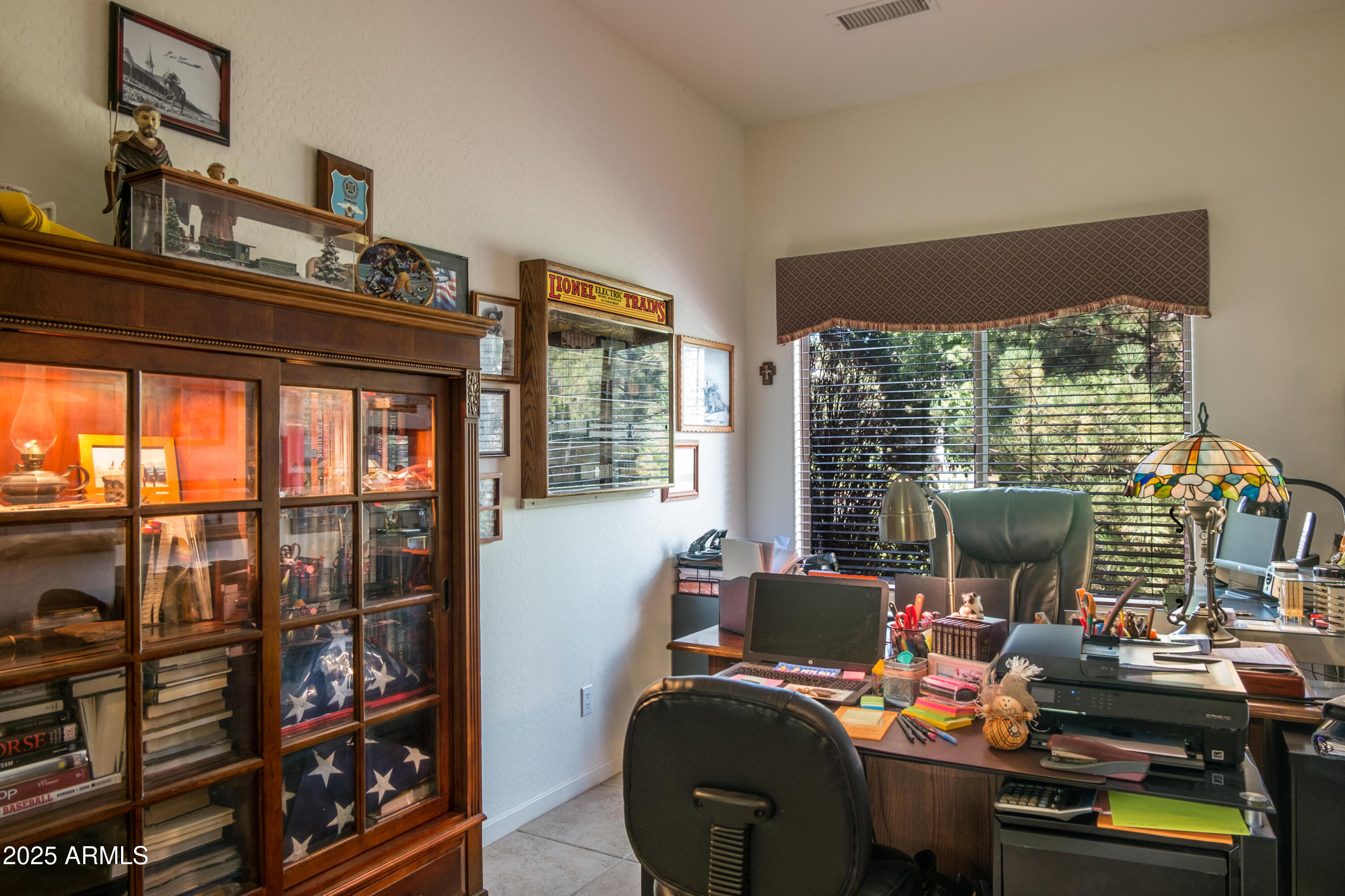 722 Crown Ridge Road Sedona, AZ 86351 - Photo 23 of 35 a view of a workspace with furniture and a window