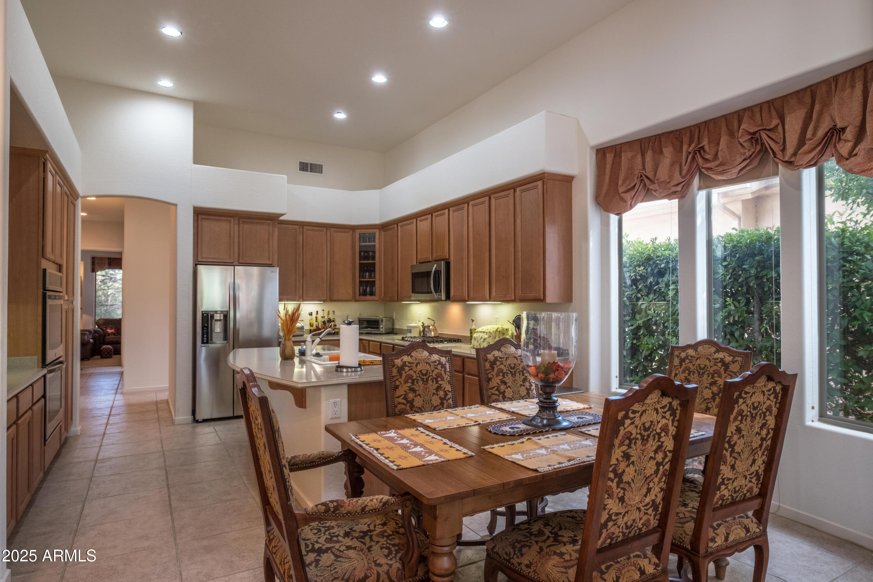 722 Crown Ridge Road Sedona, AZ 86351 - Photo 7 of 35 a view of a dining room with furniture window and outside view