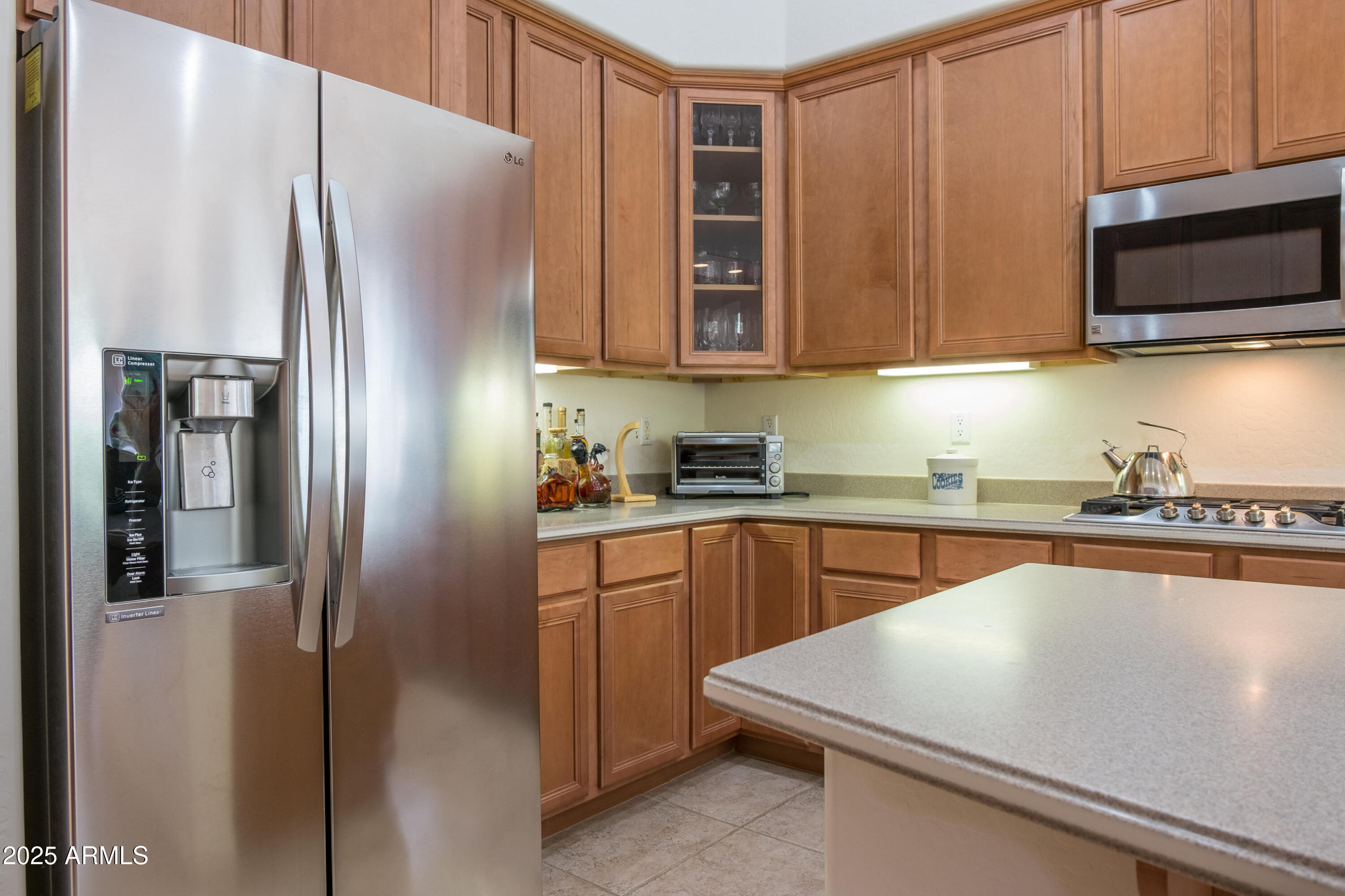 722 Crown Ridge Road Sedona, AZ 86351 - Photo 8 of 35 a kitchen with stainless steel appliances granite countertop a refrigerator sink and microwave
