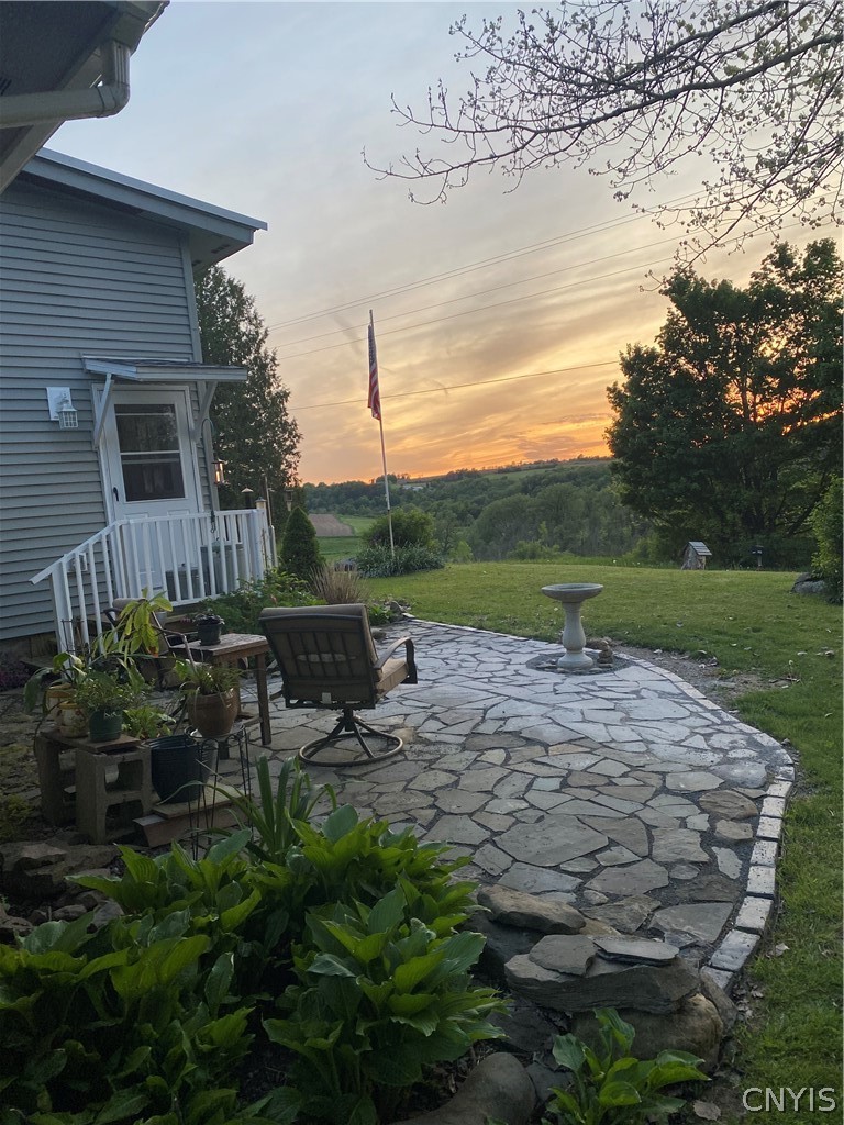 3546 Center Road Madison, NY 13402 - Photo 20 of 50 Sunset on the side patio.