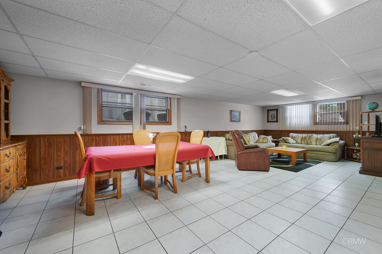 1306 West Byron Avenue Addison, IL 60101 - Photo 14 of 25 a living room with lots of furniture and a couch