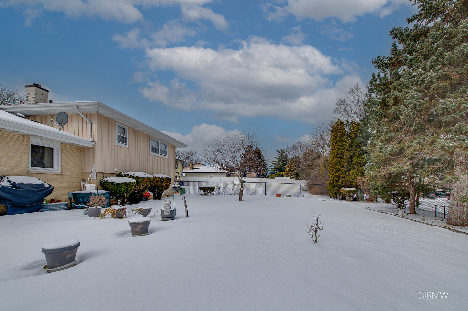 1306 West Byron Avenue Addison, IL 60101 - Photo 25 of 25 a view of the patio with couches and a fire pit