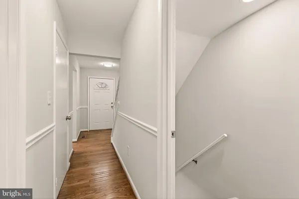 a view of a hallway with a closet