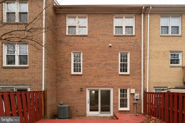 a front view of a house with a glass windows
