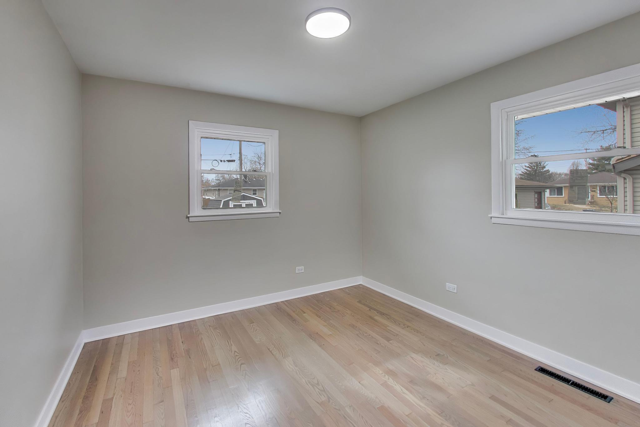 2022 38th Street Highland, IN 46322 - Photo 24 of 41 an empty room with a window