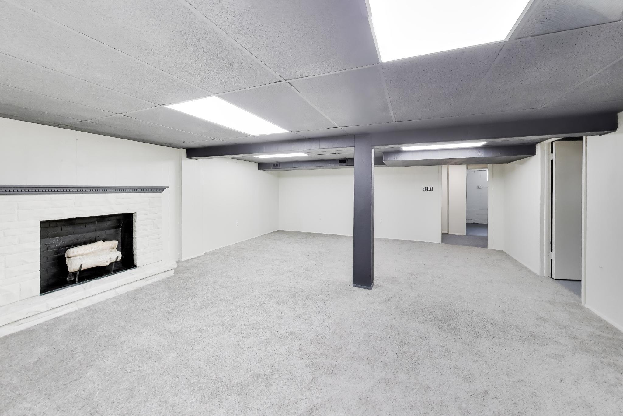 2022 38th Street Highland, IN 46322 - Photo 29 of 41 a view of an empty room with a fireplace