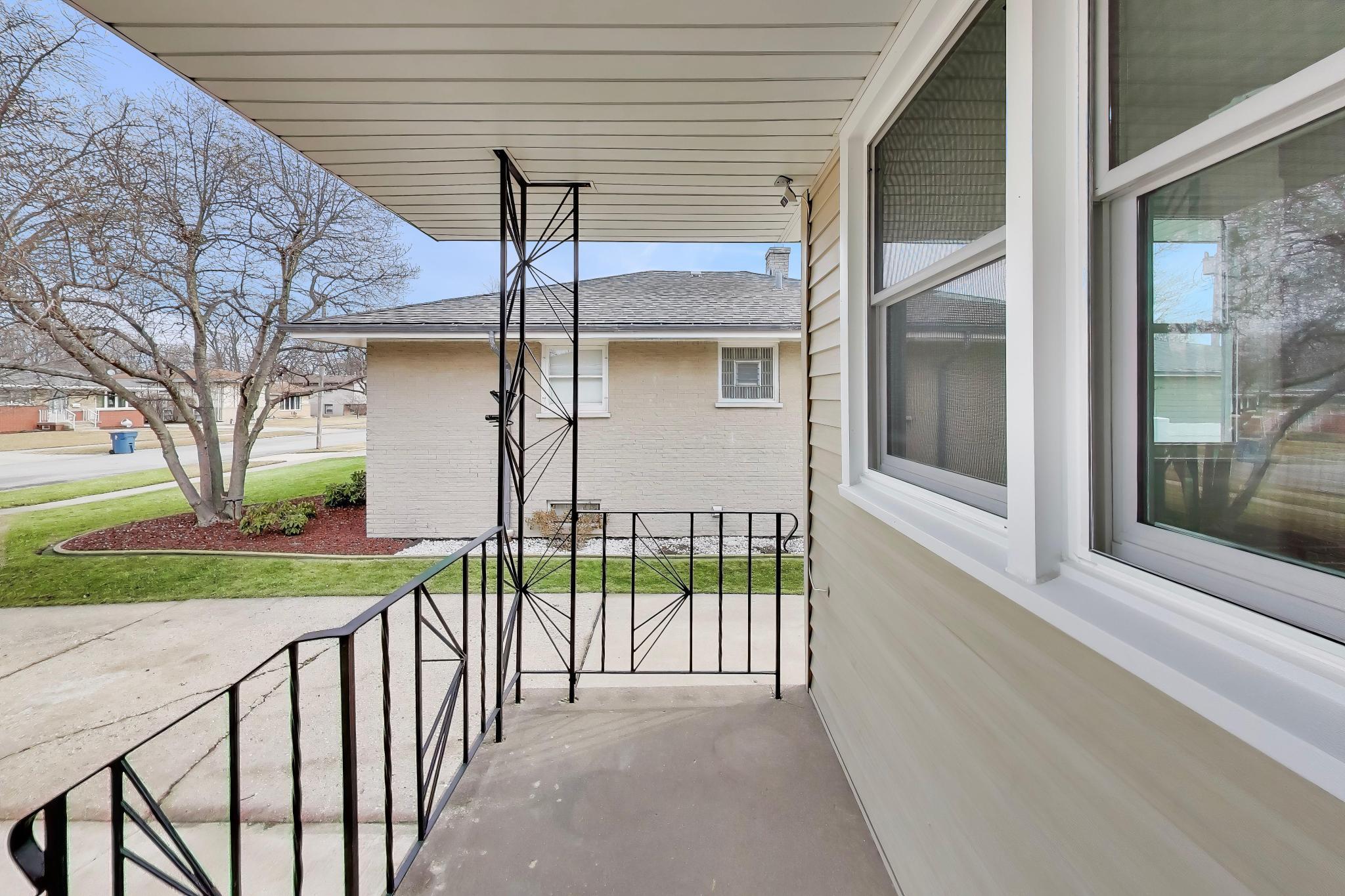 2022 38th Street Highland, IN 46322 - Photo 6 of 41 a view of a house with a porch