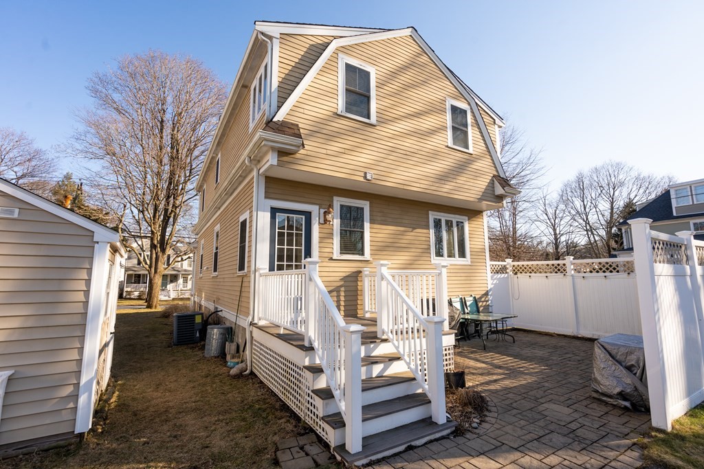 59 Elm Street Hingham, MA 02043 - Photo 2 of 33 a view of a house with a yard