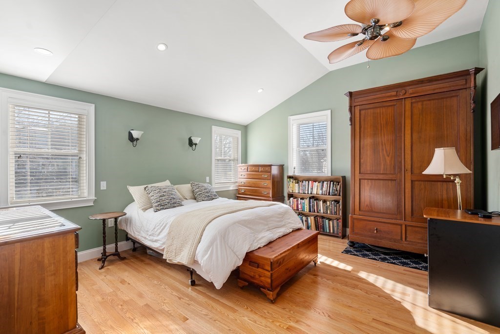 59 Elm Street Hingham, MA 02043 - Photo 23 of 33 a bedroom with a bed and wooden floor