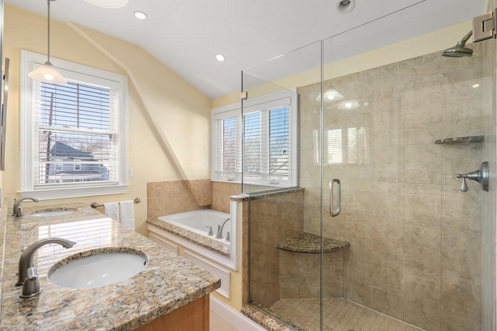 59 Elm Street Hingham, MA 02043 - Photo 25 of 33 a living room with furniture and a floor to ceiling window