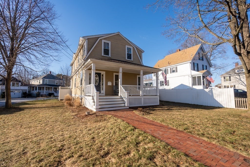59 Elm Street Hingham, MA 02043 - Photo 30 of 33 a front view of a house with a yard