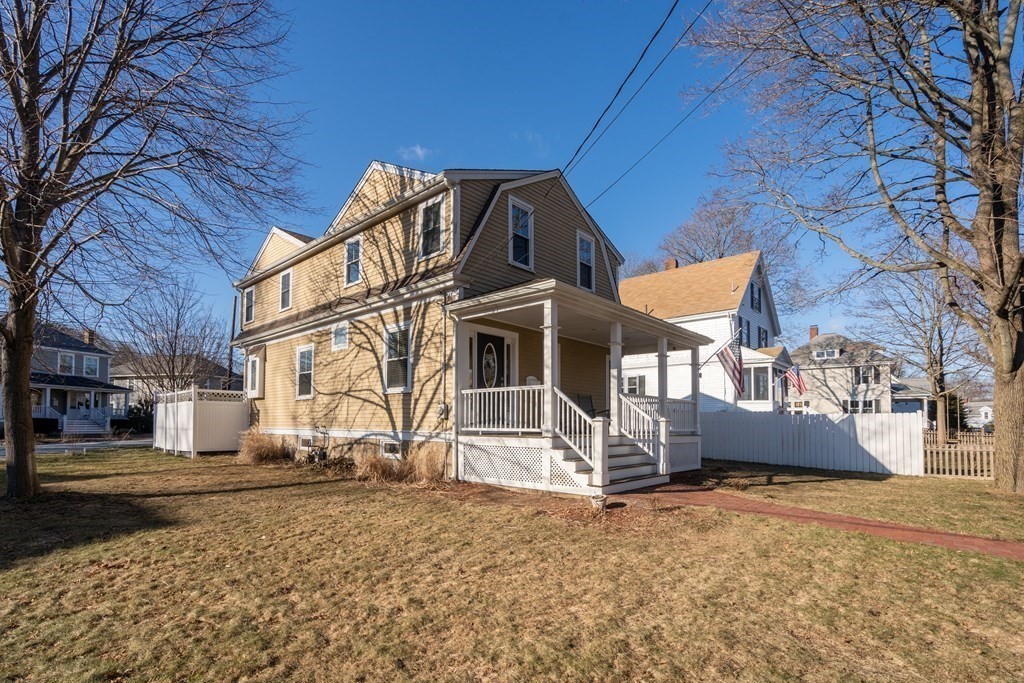 59 Elm Street Hingham, MA 02043 - Photo 31 of 33 a view of a house with a yard