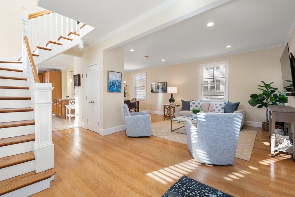 59 Elm Street Hingham, MA 02043 - Photo 4 of 33 a living room with furniture and wooden floor