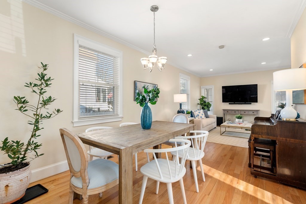 59 Elm Street Hingham, MA 02043 - Photo 9 of 33 a view of a dining room with furniture window and wooden floor