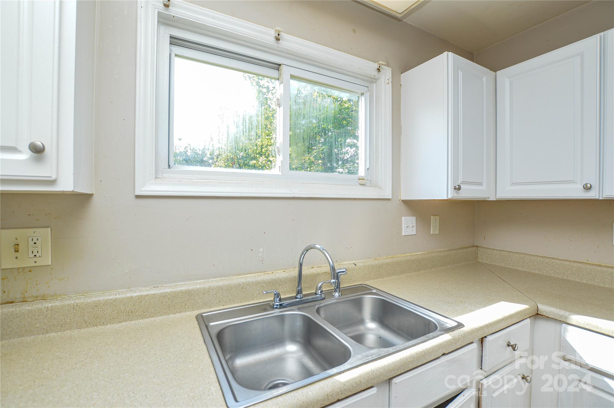 1138 White Plains Road Charlotte, NC 28213 - Photo 15 of 36 a close view of sink and tap