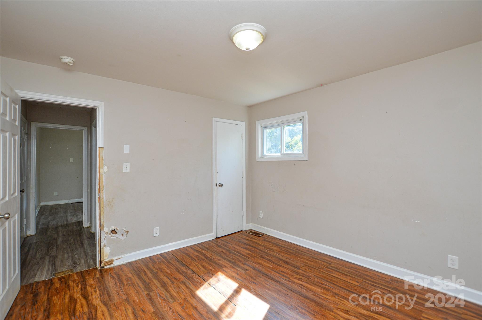 1138 White Plains Road Charlotte, NC 28213 - Photo 17 of 36 wooden floor in an empty room