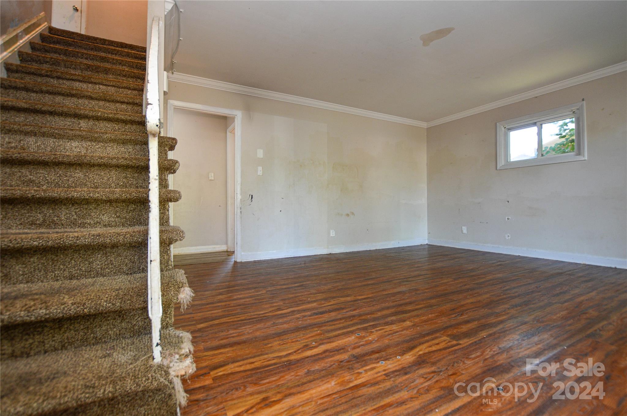 1138 White Plains Road Charlotte, NC 28213 - Photo 6 of 36 a view of wooden floor and windows in a room