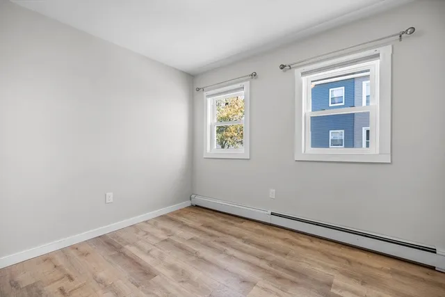 a view of empty room with windows