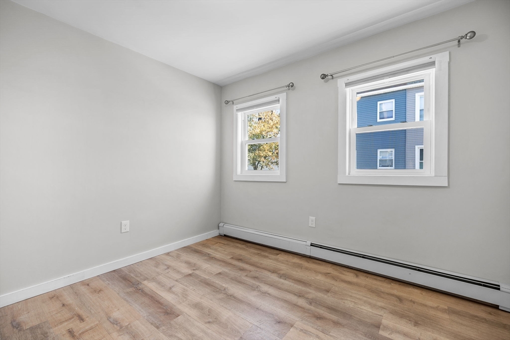 300 Marginal Street, Unit 3 Boston, MA 02128 - Photo 12 of 19 a view of empty room with windows