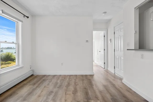 a view of an empty room and window