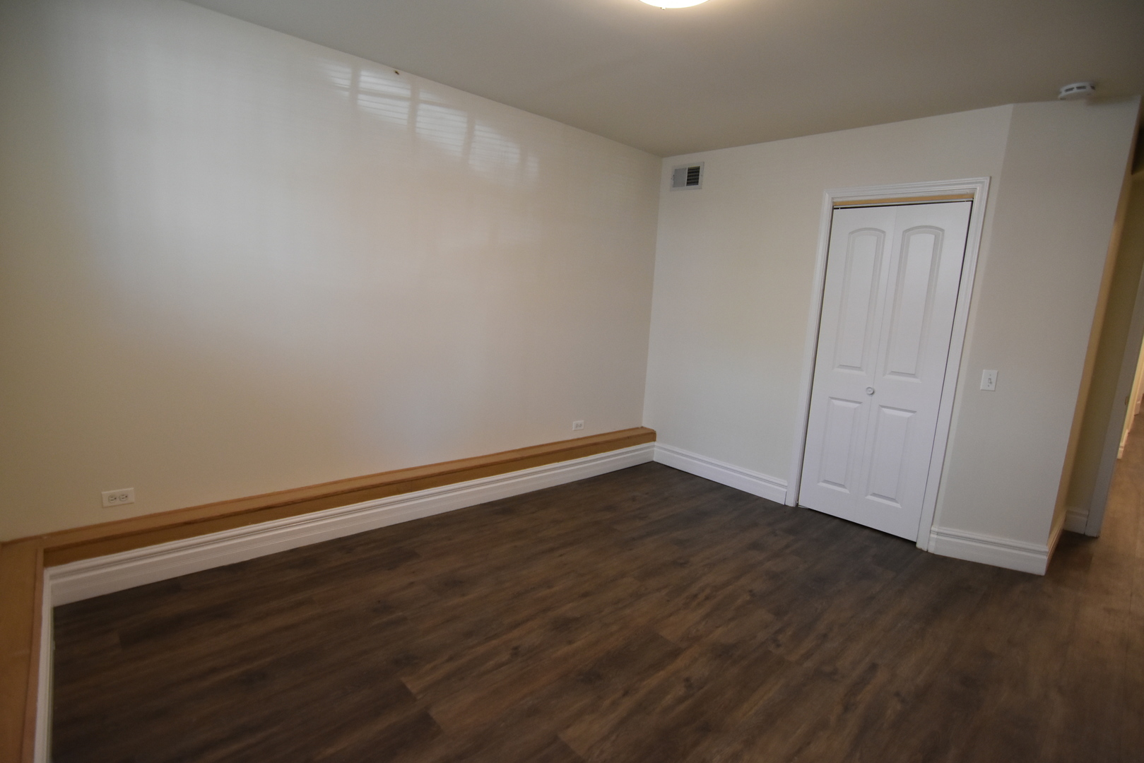 953 West Fletcher Street, Unit 1 Chicago, IL 60657 - Photo 15 of 23 a view of room with wooden floor