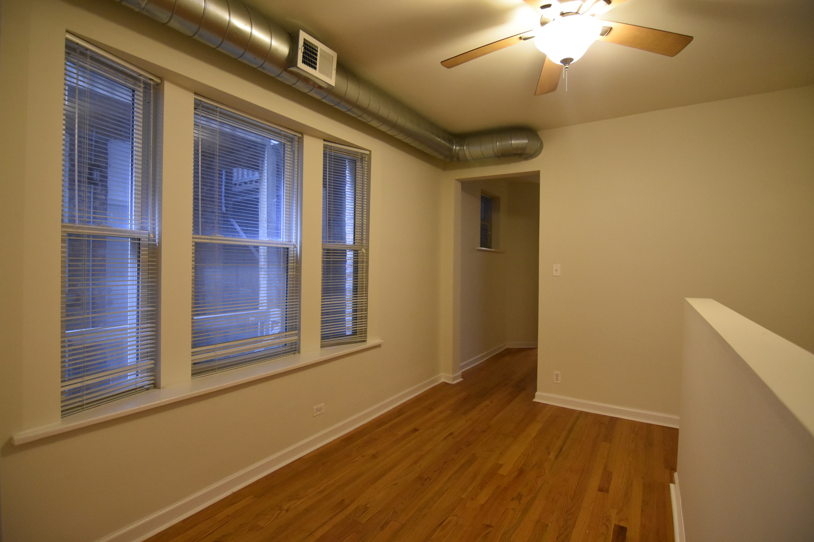 953 West Fletcher Street, Unit 1 Chicago, IL 60657 - Photo 6 of 23 a view of empty room with wooden floor