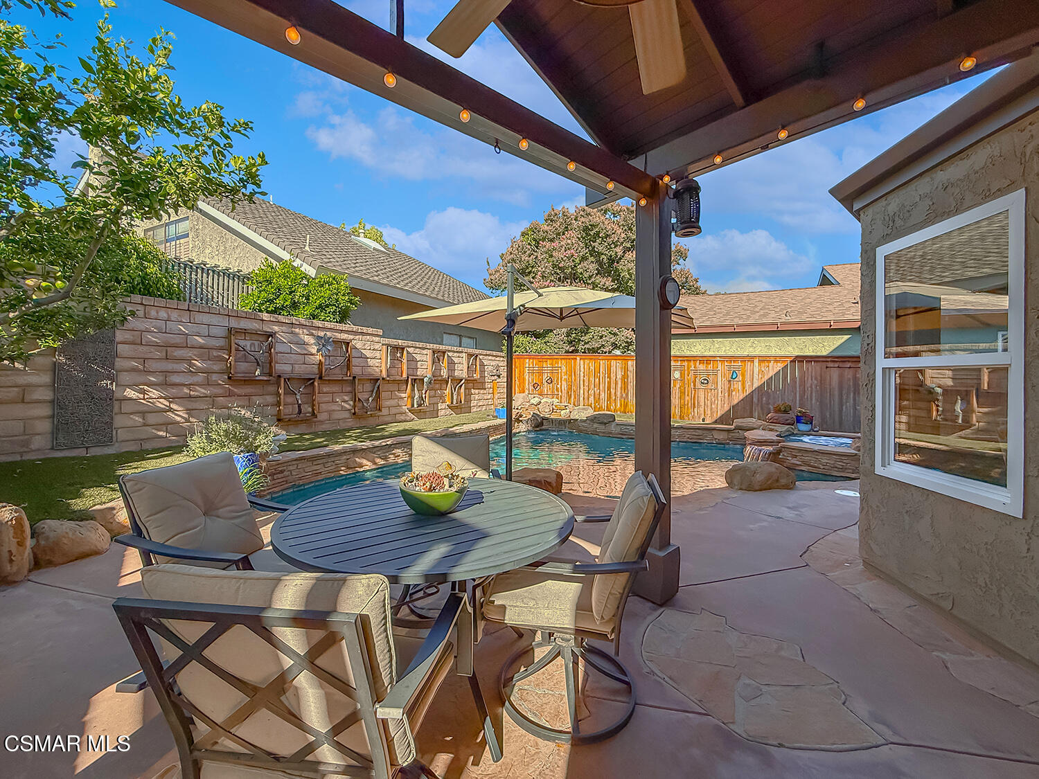 4581 Lubbock Drive Simi Valley, CA 93063 - Photo 38 of 53 a view of backyard with outdoor seating