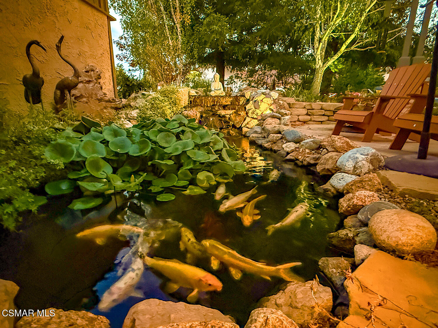 4581 Lubbock Drive Simi Valley, CA 93063 - Photo 52 of 53 a backyard of a house with table and chairs