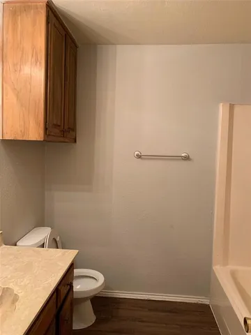 a bathroom with a sink and a toilet