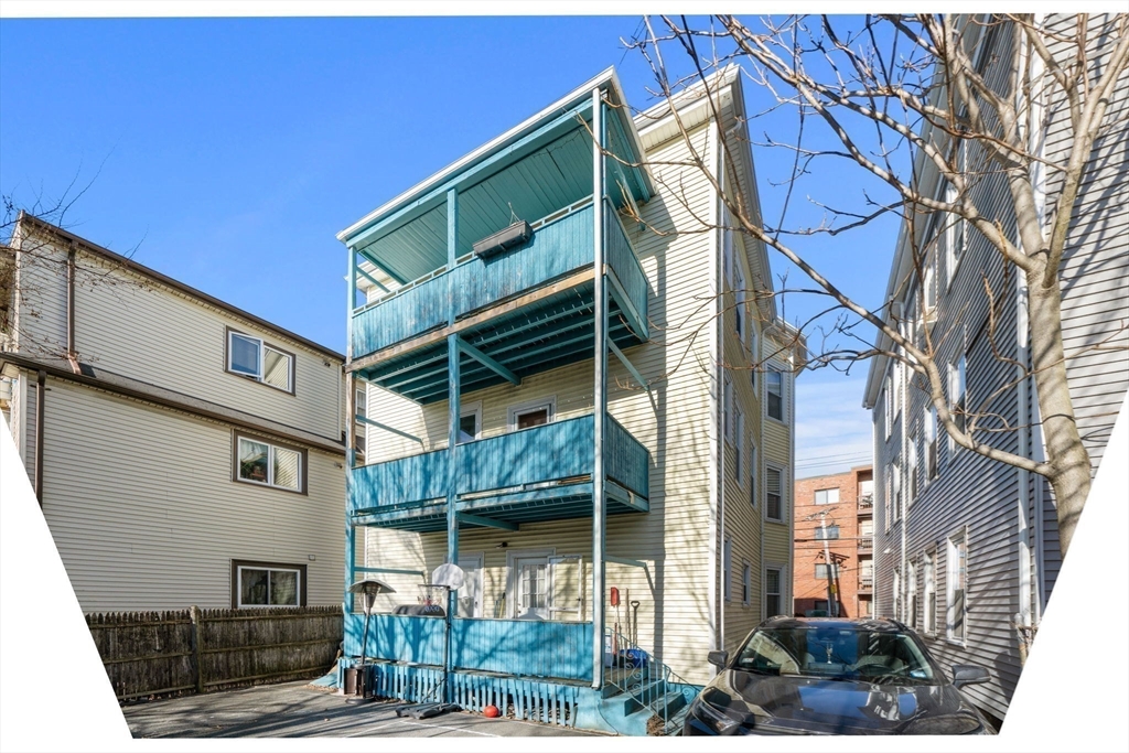 67 School Street Everett, MA 02149 - Photo 35 of 37 a view of a house with a street