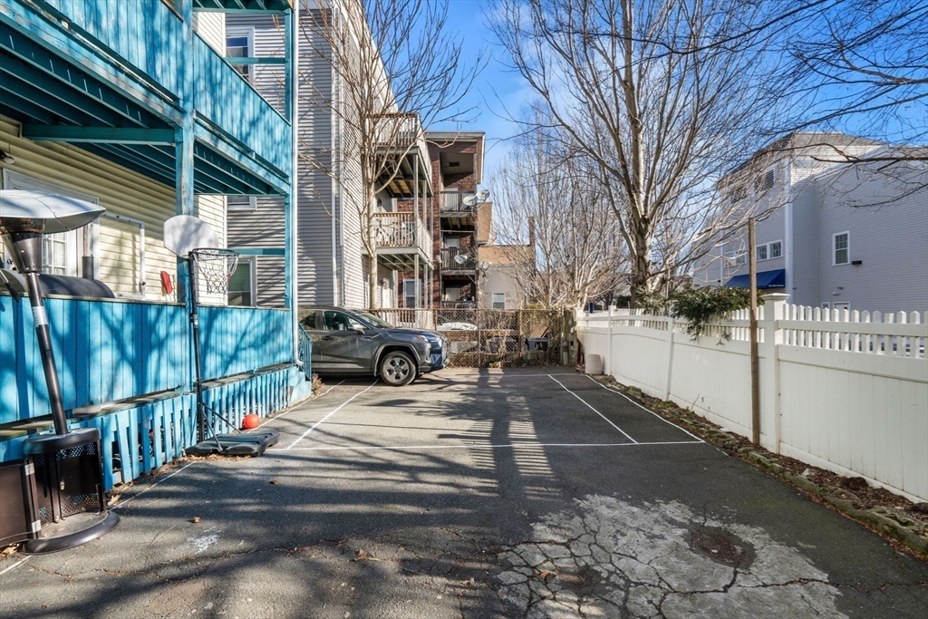 67 School Street Everett, MA 02149 - Photo 37 of 37 a view of a building with a yard