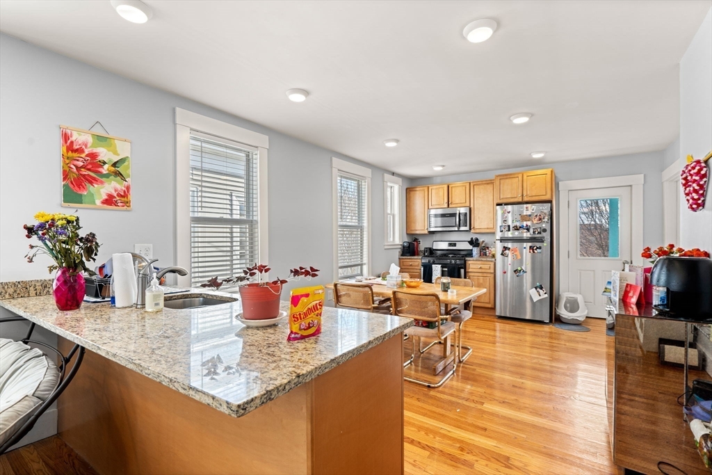67 School Street Everett, MA 02149 - Photo 10 of 37 a view of a living room and dining room