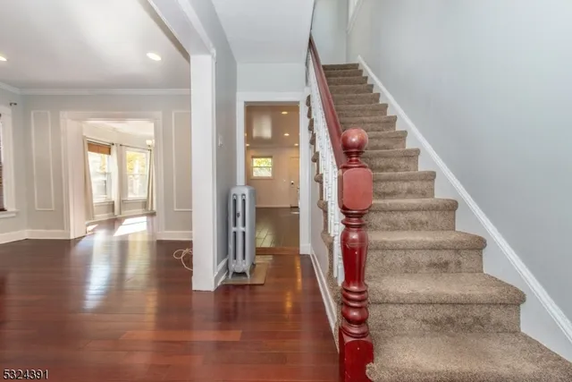 wooden floor view of an entryway with wooden floor