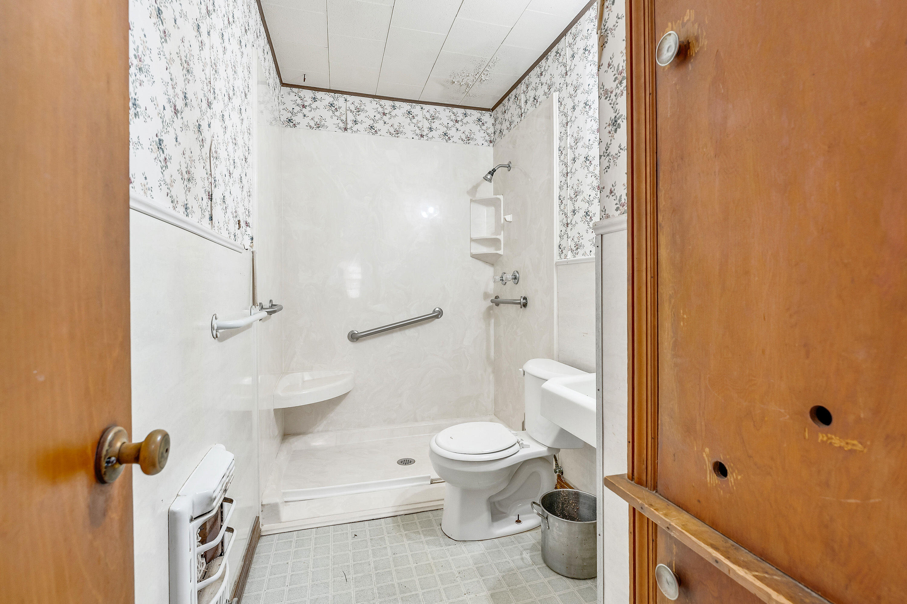 2808 1st Street Lubbock, TX 79415 - Photo 8 of 9 a bathroom with a toilet and a shower