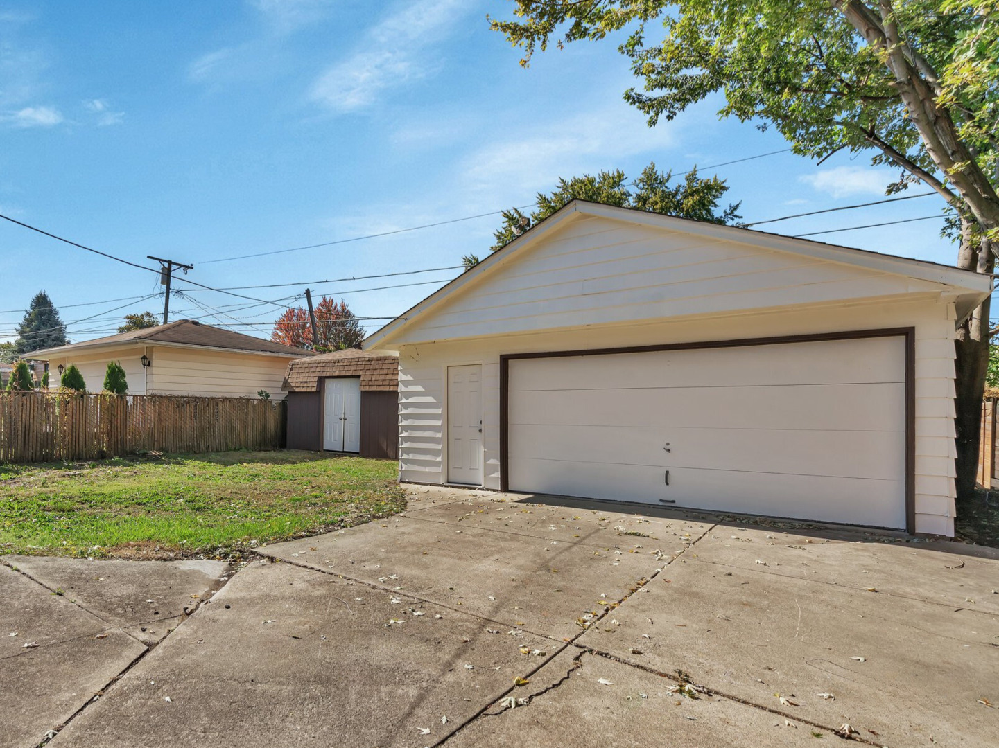 10632 Oak Avenue Chicago Ridge, IL 60415 - Photo 20 of 20 a front view of a house with a yard and garage