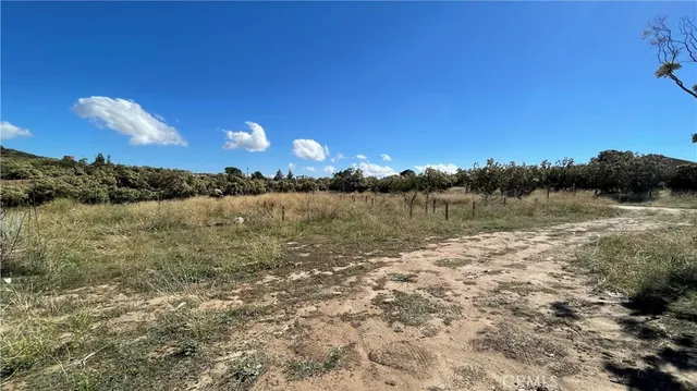 a view of lake with sunset
