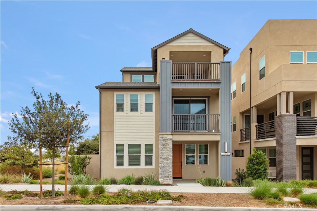 163 Restore Irvine, CA 92618 - Photo 1 of 45 a front view of residential houses