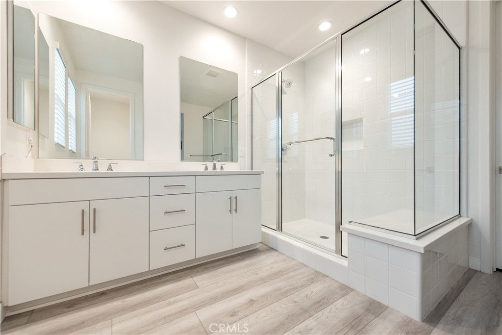 163 Restore Irvine, CA 92618 - Photo 15 of 45 a bathroom with a double vanity sink mirror and double