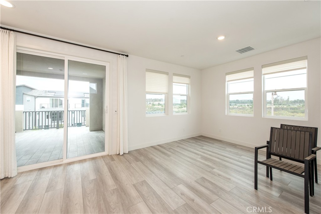 163 Restore Irvine, CA 92618 - Photo 21 of 45 a view of an empty room window and wooden floor