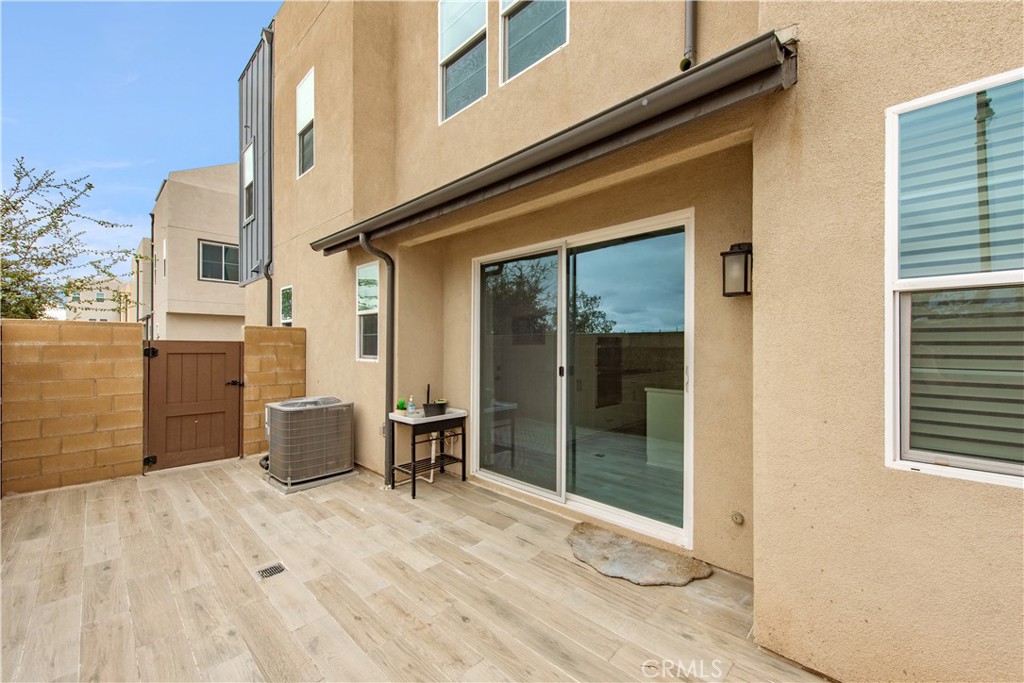 163 Restore Irvine, CA 92618 - Photo 25 of 45 a view of a house with a barbeque