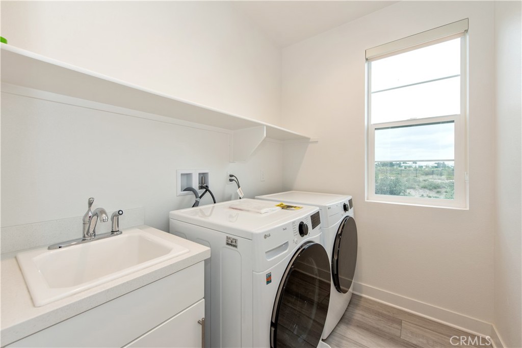 163 Restore Irvine, CA 92618 - Photo 26 of 45 a utility room with dryer and washer