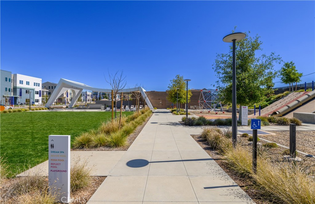 163 Restore Irvine, CA 92618 - Photo 28 of 45 a view of a swimming pool with a patio
