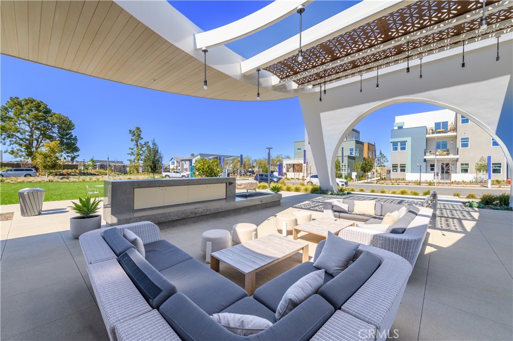 163 Restore Irvine, CA 92618 - Photo 33 of 45 a view of a patio with swimming pool table and chairs